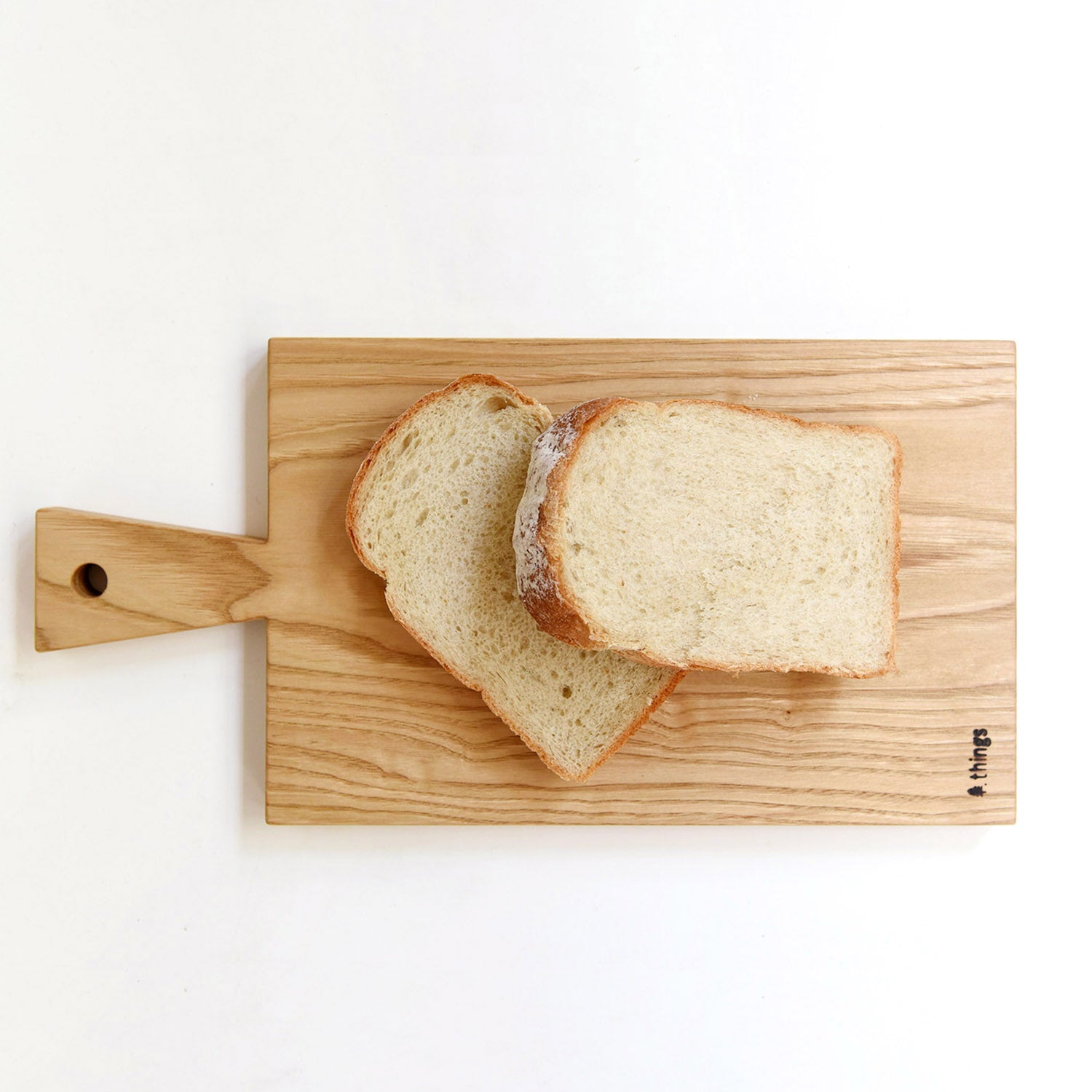 食パン２切れがちょうど並べられるくらいサイズ。<br>食卓で安心して使えるよう亜麻仁油で仕上げています。